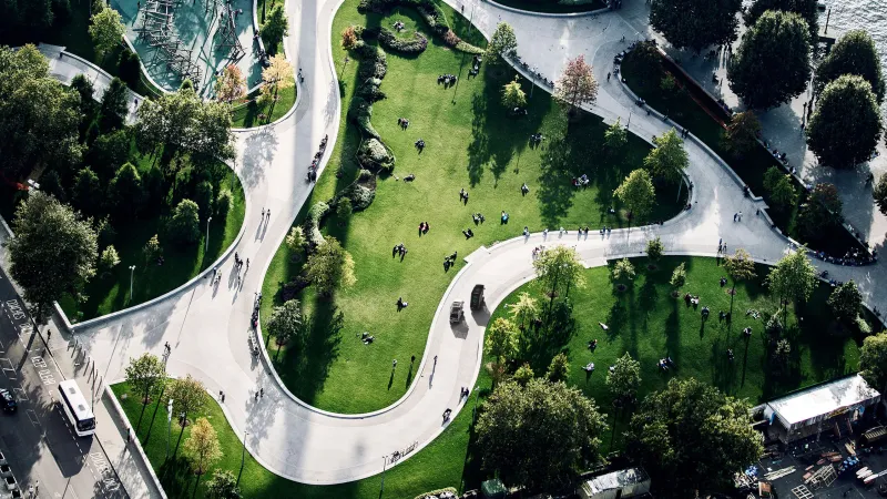 Aerial view of City Park, with two electric cargo bikes making their way along the winding paths.